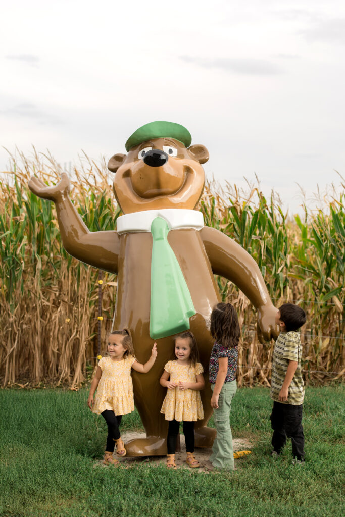 Kids around Yogi Bear