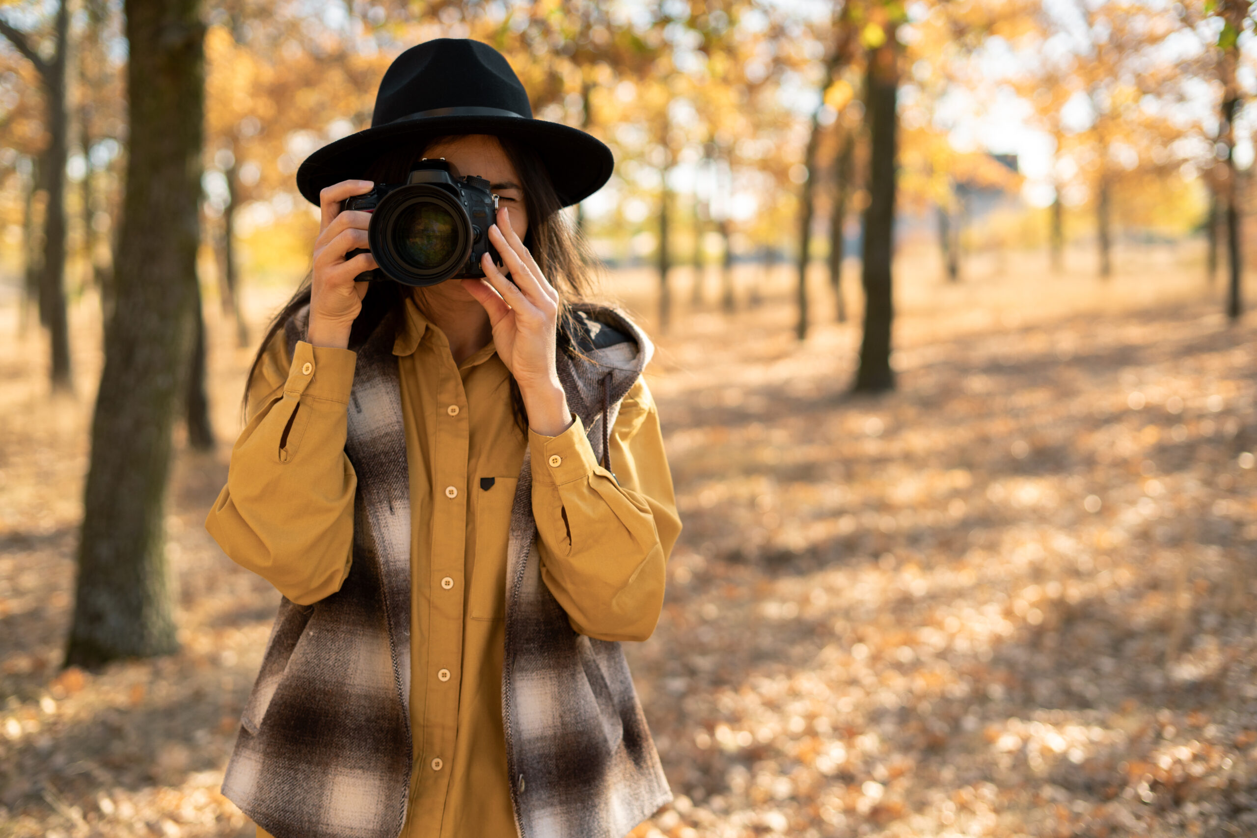 Women taking a fall photo