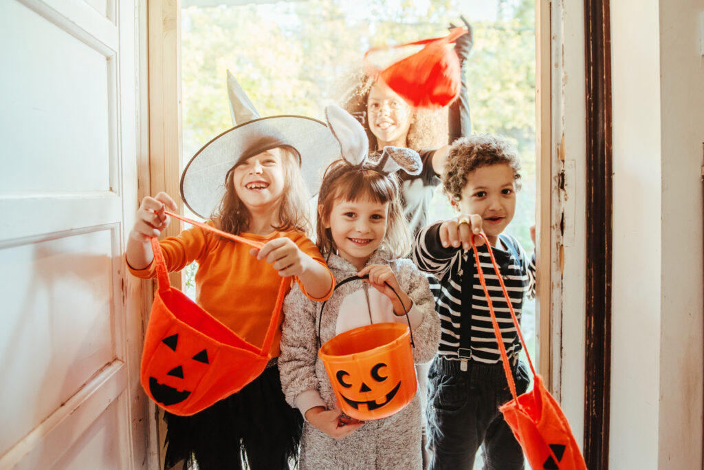 Kids in door trick-or-treating