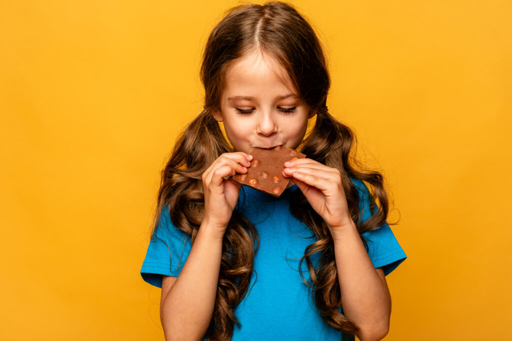 Child eating Halloween Candy