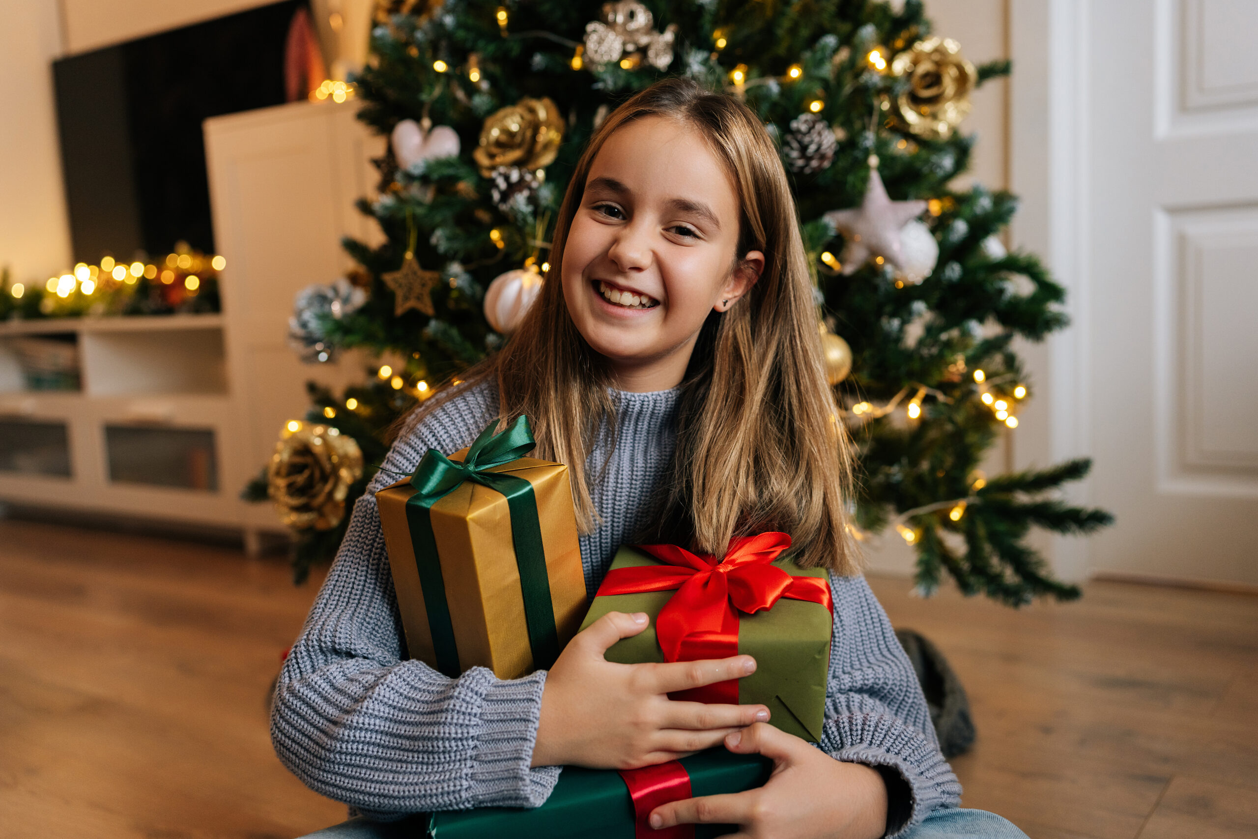 Girl holding Christmas Presents